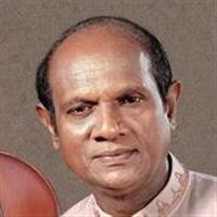 Portrait photo of the artist Amarasiri Peiris