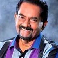 Portrait photo of the artist Bandula Wijeweera