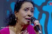 Portrait photo of the artist Dayarathna Ranathunga