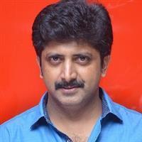 Portrait photo of the artist Mohan Raj