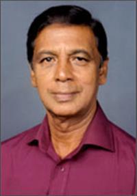 Portrait photo of the artist Moris Wijesingha