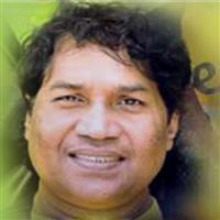 Portrait photo of the artist Neil Warnakulasuriya