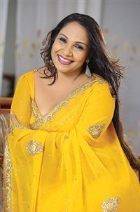 Portrait photo of the artist Nelu Adhikari