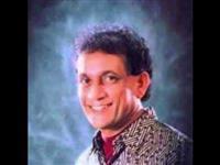 Portrait photo of the artist Shelton Muthunamage